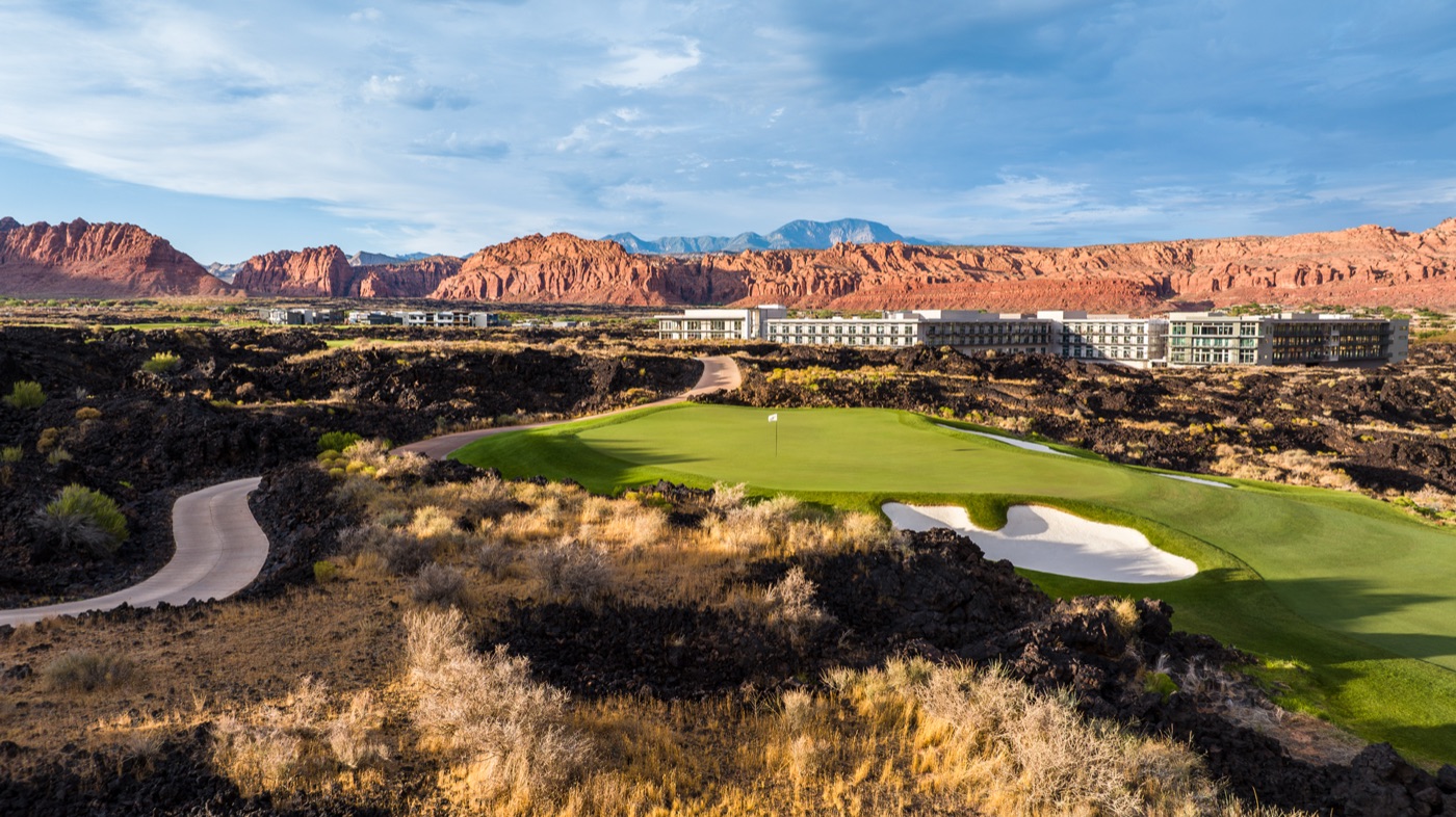 Black Desert Resort golf course set against red rock mountains in St. George, Utah